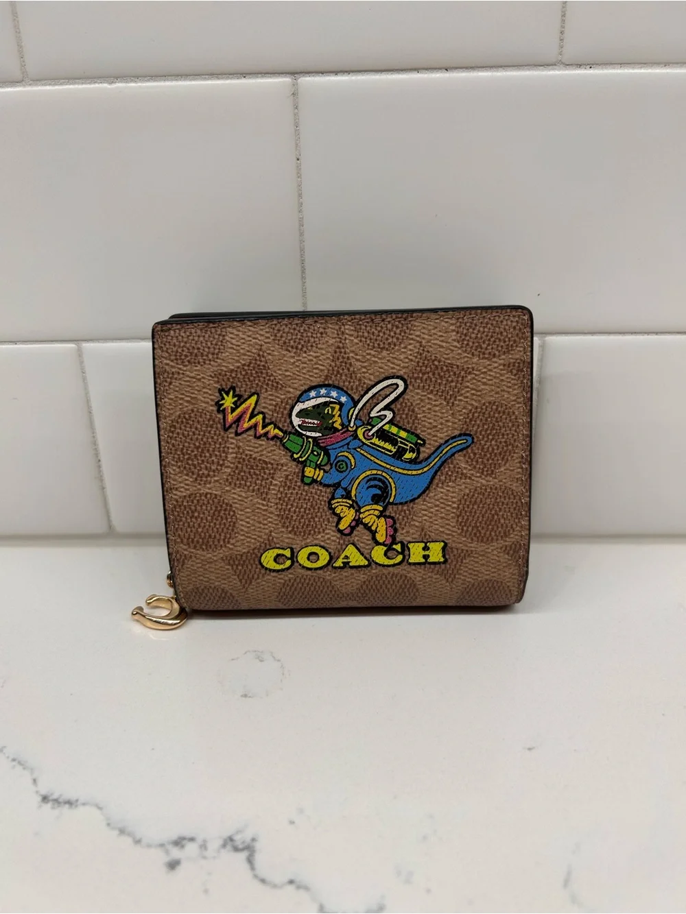 NWOT Cosmic Coach Snap Wallet in Signature Canvas with Rexy Print